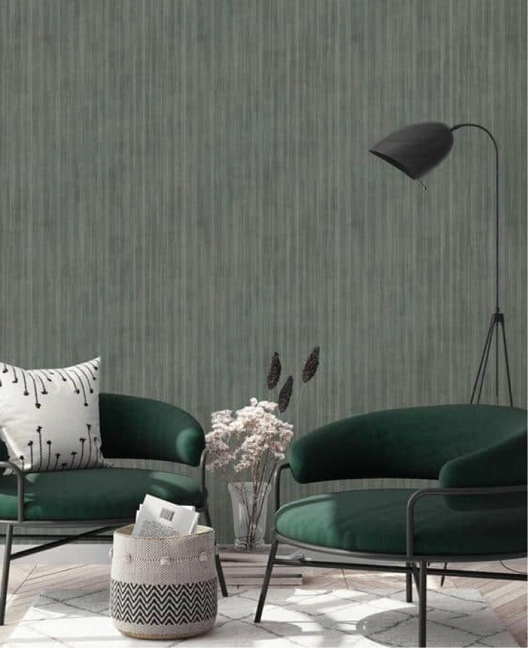 Living room with minimalist green wallpaper by hohenberger